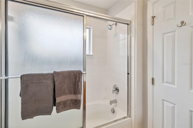 163 Tigerlily Ct, Davenport, FL 33837 - full bathroom with shower / bath combination with glass door