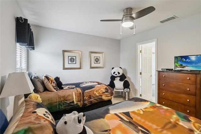 163 Tigerlily Ct, Davenport, FL 33837 - bedroom featuring a ceiling fan