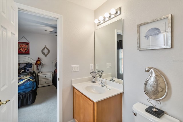 163 Tigerlily Ct, Davenport, FL 33837 - bathroom featuring vanity and toilet