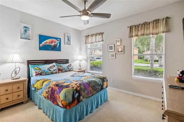 163 Tigerlily Ct, Davenport, FL 33837 - bedroom featuring light carpet and a ceiling fan