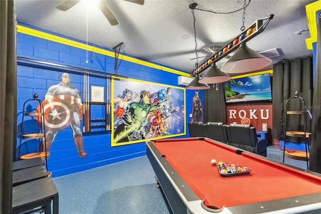 163 Tigerlily Ct, Davenport, FL 33837 - game room featuring a ceiling fan, billiards table, speckle patterned floor, and a wall unit AC