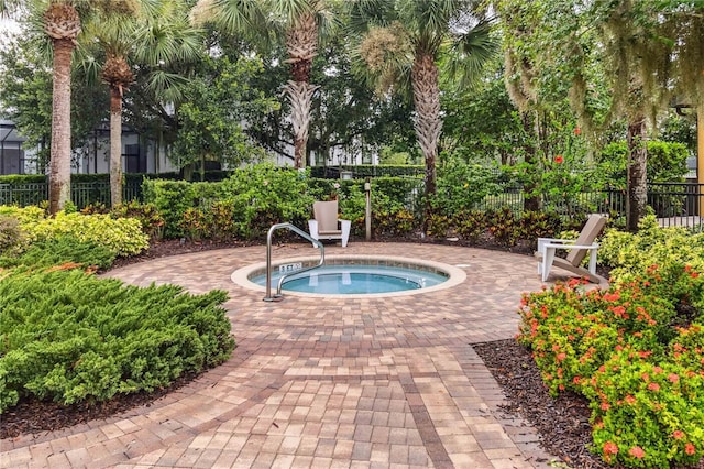 163 Tigerlily Ct, Davenport, FL 33837 - view of pool featuring a hot tub