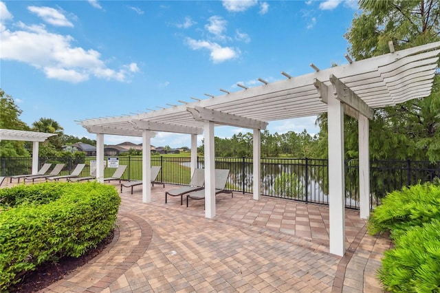 163 Tigerlily Ct, Davenport, FL 33837 - view of patio featuring a pergola and a water view