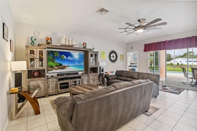 163 Tigerlily Ct, Davenport, FL 33837 - living room with light tile patterned flooring and ceiling fan