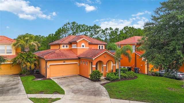 163 Tigerlily Ct, Davenport, FL 33837 - mediterranean / spanish-style house featuring stucco siding, a front lawn, concrete driveway, and a garage