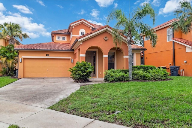163 Tigerlily Ct, Davenport, FL 33837 - mediterranean / spanish-style home with a tile roof, stucco siding, driveway, a front lawn, and a garage