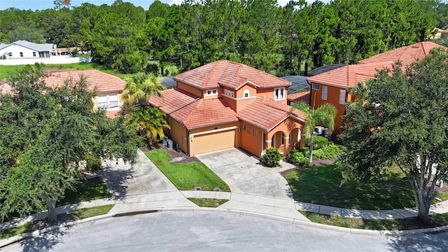 163 Tigerlily Ct, Davenport, FL 33837 - view from above of property with a forest