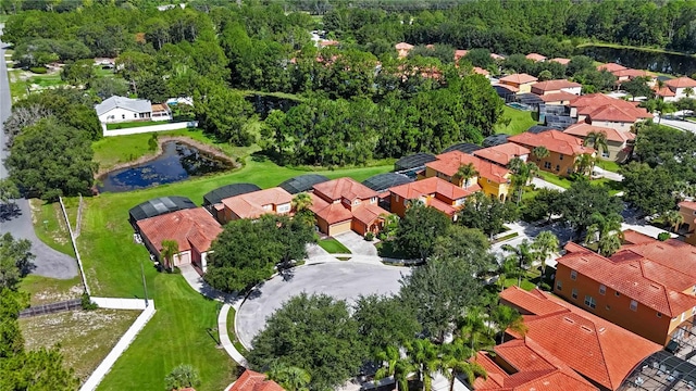 163 Tigerlily Ct, Davenport, FL 33837 - aerial perspective of suburban area featuring a nearby body of water