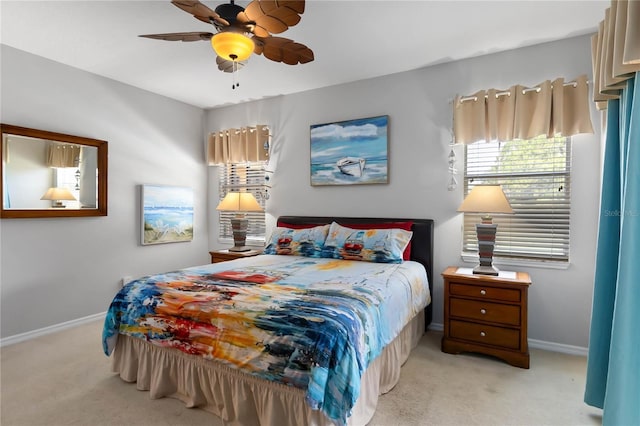 163 Tigerlily Ct, Davenport, FL 33837 - carpeted bedroom featuring baseboards and a ceiling fan