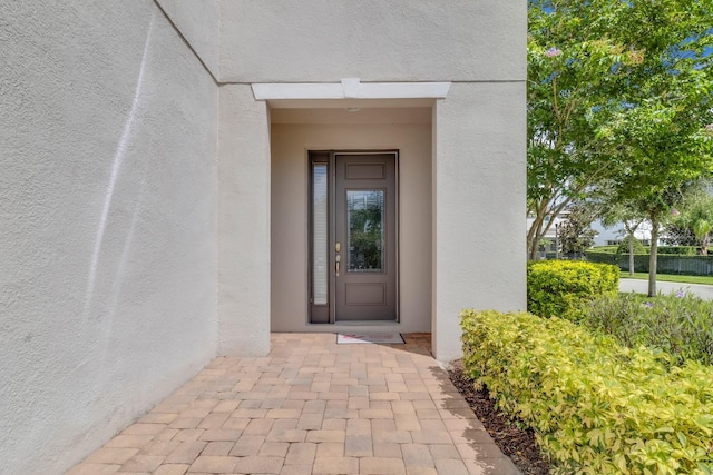 7403 Marker Ave, Kissimmee, FL 34747 - property entrance featuring stucco siding