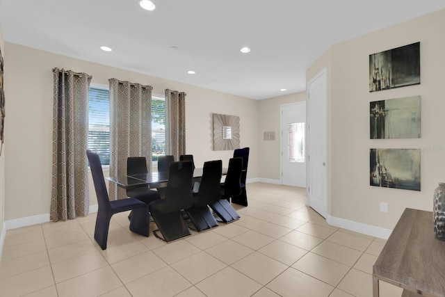 7403 Marker Ave, Kissimmee, FL 34747 - dining area with recessed lighting and light tile patterned floors