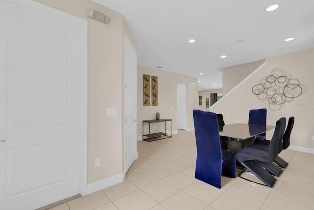 7403 Marker Ave, Kissimmee, FL 34747 - dining space featuring stairs, recessed lighting, and light tile patterned floors