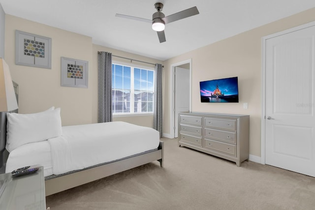 7403 Marker Ave, Kissimmee, FL 34747 - bedroom featuring light carpet and ceiling fan