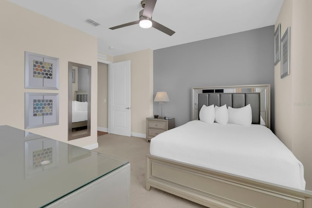 7403 Marker Ave, Kissimmee, FL 34747 - bedroom featuring light carpet and a ceiling fan