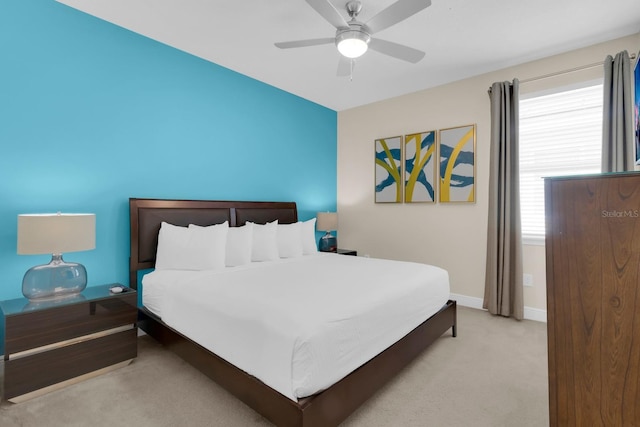 7403 Marker Ave, Kissimmee, FL 34747 - carpeted bedroom with baseboards and ceiling fan