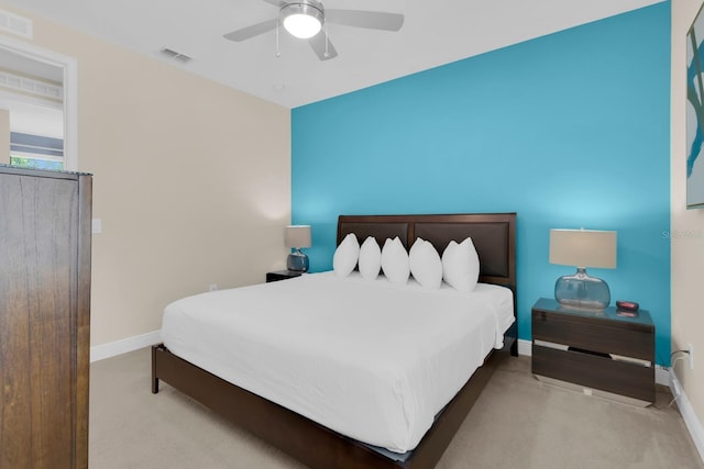 7403 Marker Ave, Kissimmee, FL 34747 - carpeted bedroom featuring baseboards and a ceiling fan