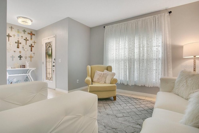 3430 Harlequin Dr, Saint Cloud, FL 34772 - tiled living area featuring baseboards