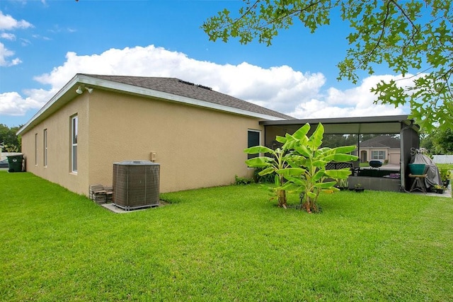 3430 Harlequin Dr, Saint Cloud, FL 34772 - view of side of home with stucco siding and a lawn