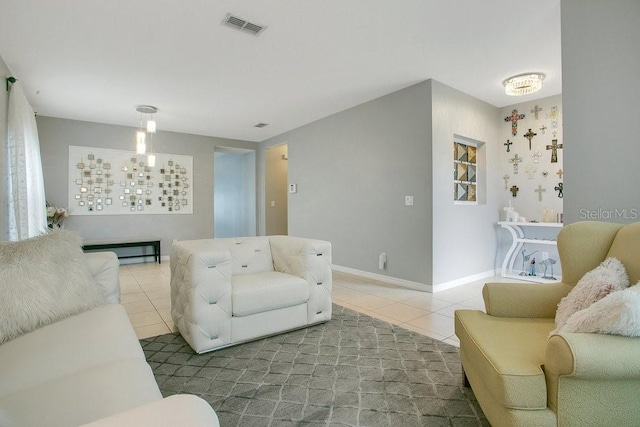 3430 Harlequin Dr, Saint Cloud, FL 34772 - living area with tile patterned floors and baseboards
