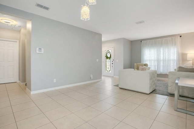 3430 Harlequin Dr, Saint Cloud, FL 34772 - living area featuring light tile patterned flooring and baseboards