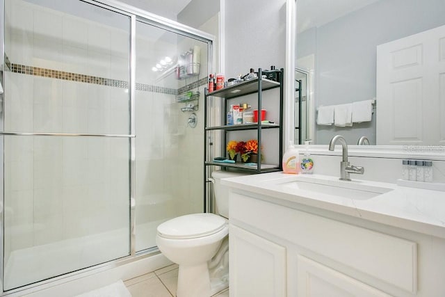 3430 Harlequin Dr, Saint Cloud, FL 34772 - bathroom with a shower stall, vanity, and tile patterned flooring