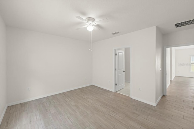 588 Meadow Bend Dr, Davenport, FL 33837 - unfurnished room featuring a ceiling fan and light wood-type flooring