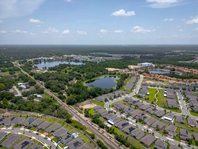 588 Meadow Bend Dr, Davenport, FL 33837 - aerial view of property's location featuring a nearby body of water and nearby suburban area