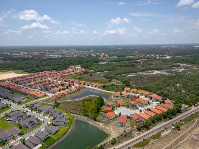 588 Meadow Bend Dr, Davenport, FL 33837 - aerial overview of property's location featuring a nearby body of water and nearby suburban area