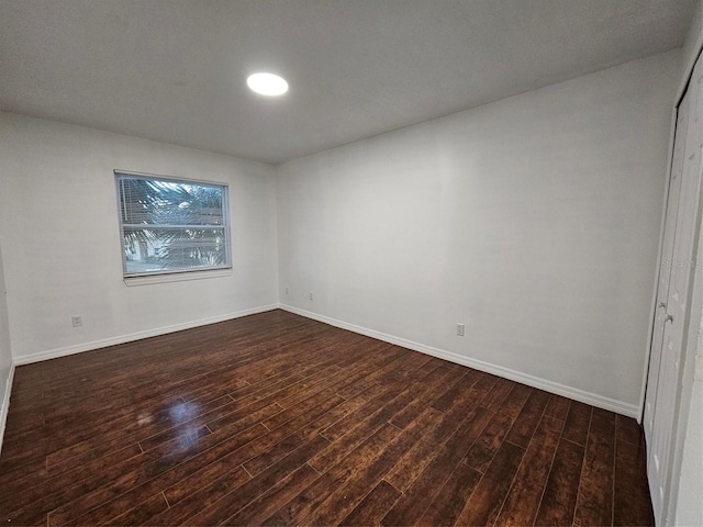 2408 Barley Club Ct Unit 7, Orlando, FL 32837 - empty room with dark wood-style flooring and baseboards