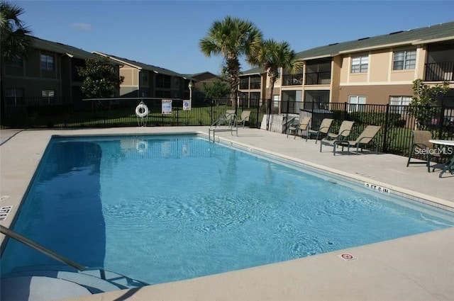 2408 Barley Club Ct Unit 7, Orlando, FL 32837 - community pool with a patio