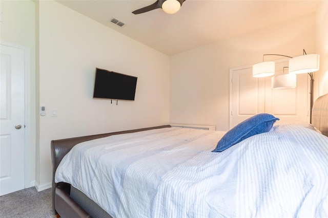 9878 Aurea Moss Ln, Orlando, FL 32832 - bedroom with carpet floors and ceiling fan