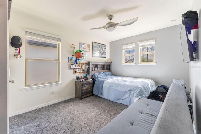 9878 Aurea Moss Ln, Orlando, FL 32832 - carpeted bedroom featuring a ceiling fan and baseboards