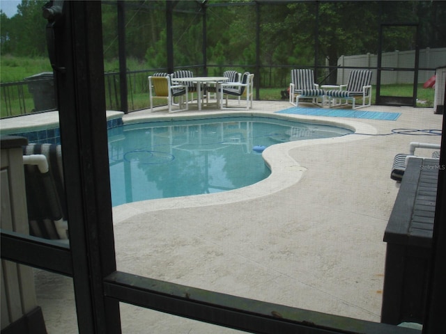 301 Sierra Way, Davenport, FL 33837 - view of pool featuring a patio area and a lanai