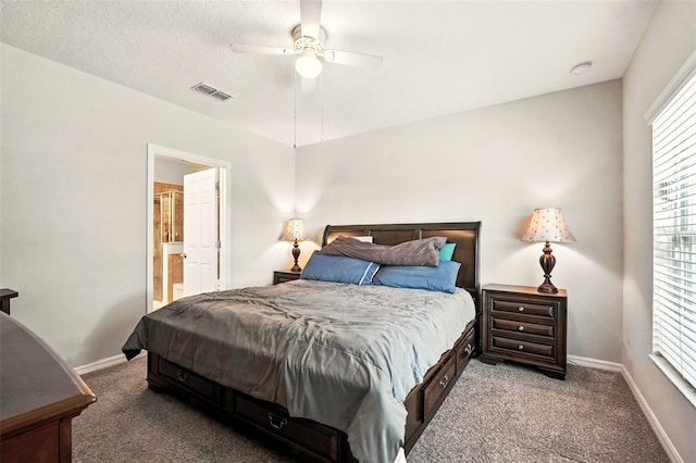 301 Sierra Way, Davenport, FL 33837 - bedroom with carpet, multiple windows, a ceiling fan, and ensuite bath