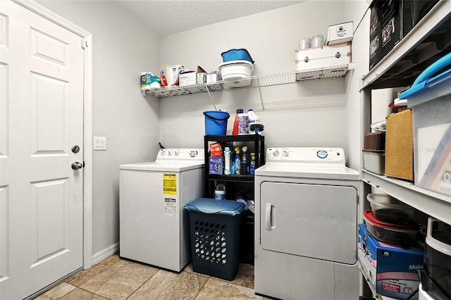 301 Sierra Way, Davenport, FL 33837 - laundry room featuring washing machine and dryer