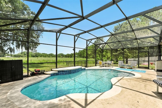 301 Sierra Way, Davenport, FL 33837 - view of swimming pool with a patio area, glass enclosure, and a lawn