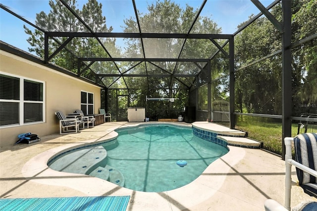 301 Sierra Way, Davenport, FL 33837 - outdoor pool featuring a patio area and glass enclosure