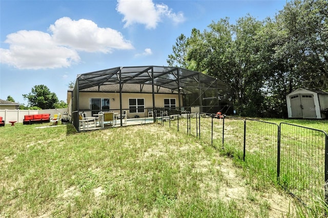 301 Sierra Way, Davenport, FL 33837 - rear view of house with a shed, a patio area, a lanai, and an outdoor living space
