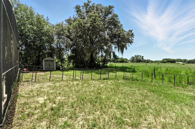 301 Sierra Way, Davenport, FL 33837 - view of yard with a shed and a view of rural / pastoral area