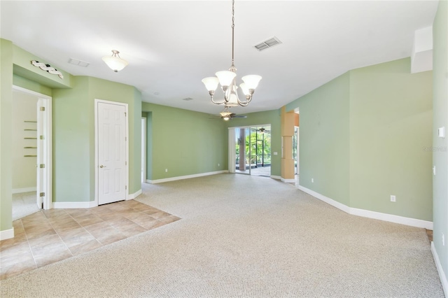 521 Milano Rd, Kissimmee, FL 34759 - empty room featuring a chandelier and carpet