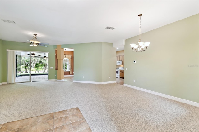521 Milano Rd, Kissimmee, FL 34759 - spare room with a chandelier, light colored carpet, and a ceiling fan