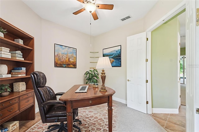 521 Milano Rd, Kissimmee, FL 34759 - home office with a ceiling fan and baseboards