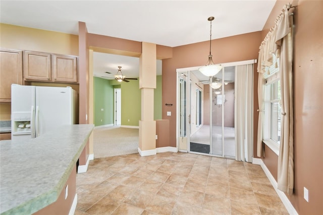 521 Milano Rd, Kissimmee, FL 34759 - unfurnished dining area featuring ceiling fan and baseboards