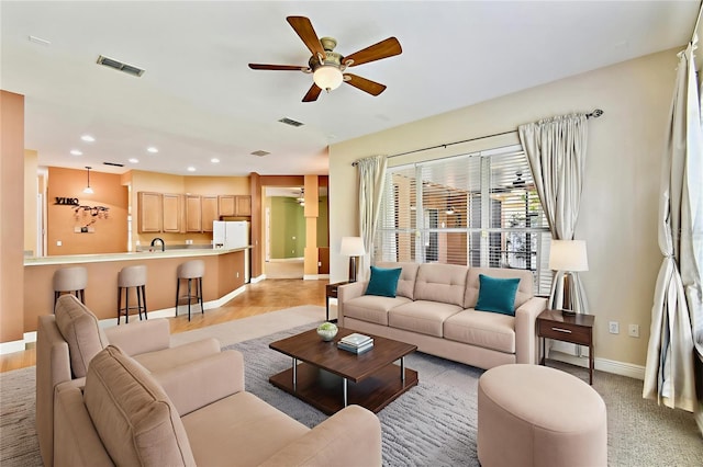 521 Milano Rd, Kissimmee, FL 34759 - living area featuring a ceiling fan, recessed lighting, and light wood finished floors