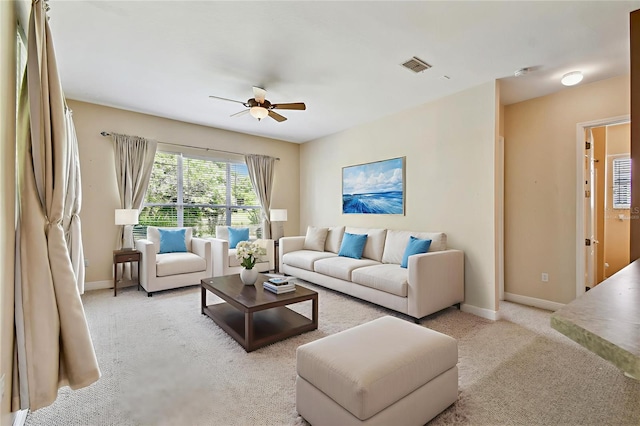 521 Milano Rd, Kissimmee, FL 34759 - living room featuring ceiling fan and light colored carpet