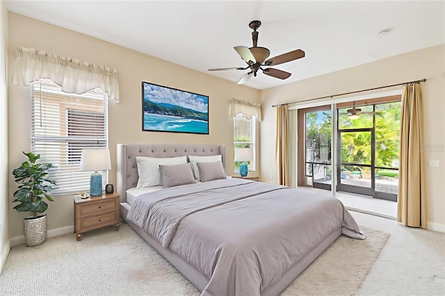521 Milano Rd, Kissimmee, FL 34759 - bedroom with access to outside, light colored carpet, and ceiling fan