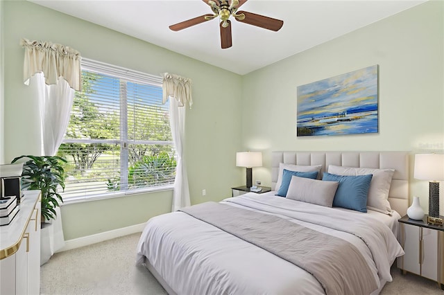 521 Milano Rd, Kissimmee, FL 34759 - bedroom with light colored carpet and ceiling fan