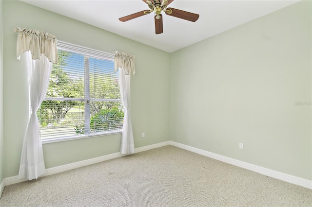 521 Milano Rd, Kissimmee, FL 34759 - carpeted empty room featuring baseboards and a ceiling fan