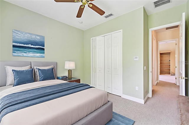 521 Milano Rd, Kissimmee, FL 34759 - bedroom featuring carpet floors, a closet, and ceiling fan