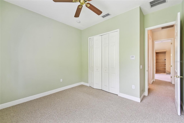 521 Milano Rd, Kissimmee, FL 34759 - unfurnished bedroom featuring carpet flooring, a closet, and ceiling fan
